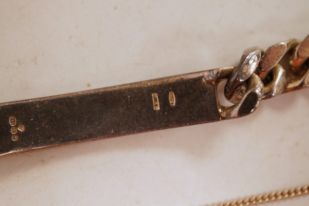 A silver necklace and bracelet, comprising: a silver ingot pendant necklace, pendant length 5.2cm including bail; and a silver curb link ID bracelet, length 20cm, each with British hallmarks, combined gross weight 82 gra